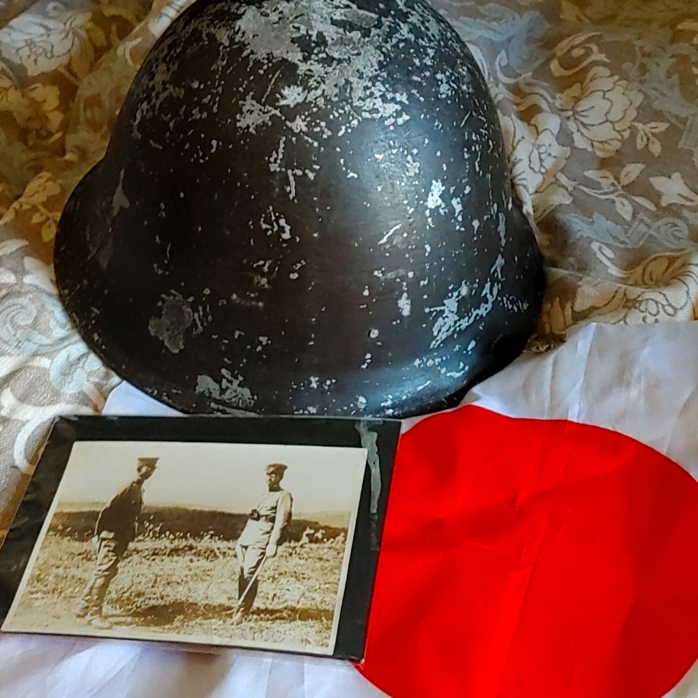 Japanese World War II helmet with rare photo of emperor and his brother